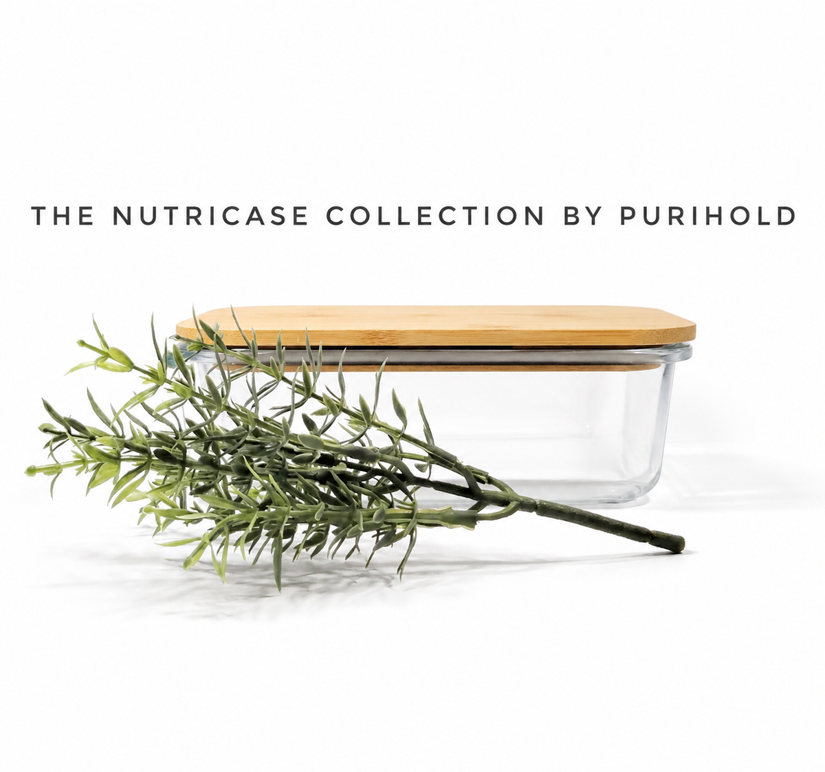 A clear glass rectangular container with a light real bamboo lid, shown on a white background with decorative green branches in front. Text at the top reads 'THE NUTRICASE COLLECTION BY PURIHOLD'.